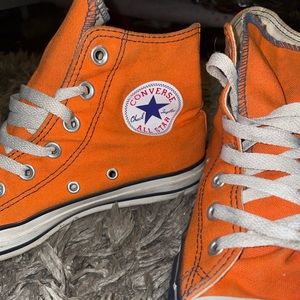 Orange Converse High tops